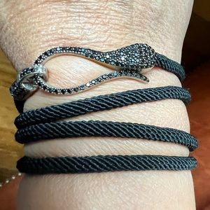 Wraparound cobra bracelet, with black stones.